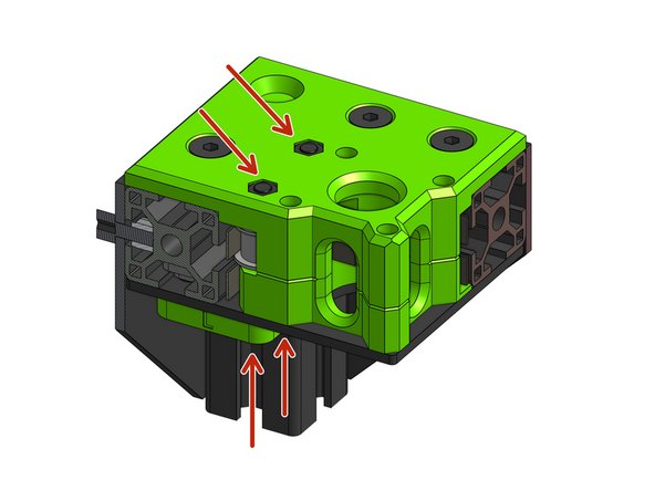 Place the top part on the assembly and fasten it with the M5 screws from underneath. The parts need to be flush but not so tight that they'll stop the idlers from rotating