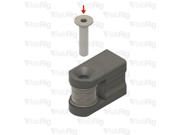 Insert the M5x22 countersink screw and tighten it to secure the idler assembly into the tensioner arm