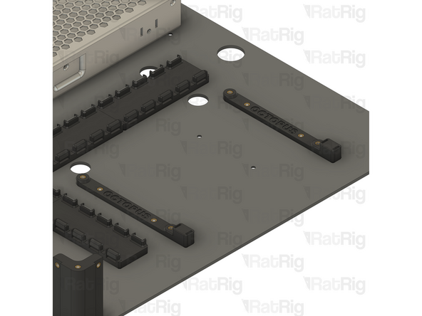 Tighten all four M3x6 Countersink Screws to secure the cable guides to the base panel