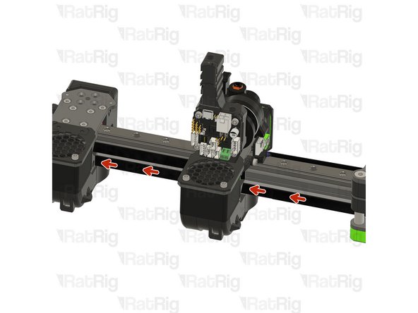 Feed the T1 belt through the designated hole at the rear of Toolhead T0, ensure that the belt is correctly seated on all idlers.