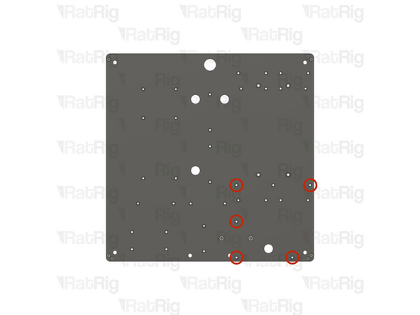 Locate the five marked holes in the base panel