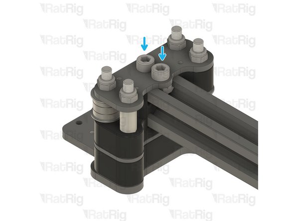 Insert the screws through the plate, and tighten them to the t-nuts on the 2020 extrusion.