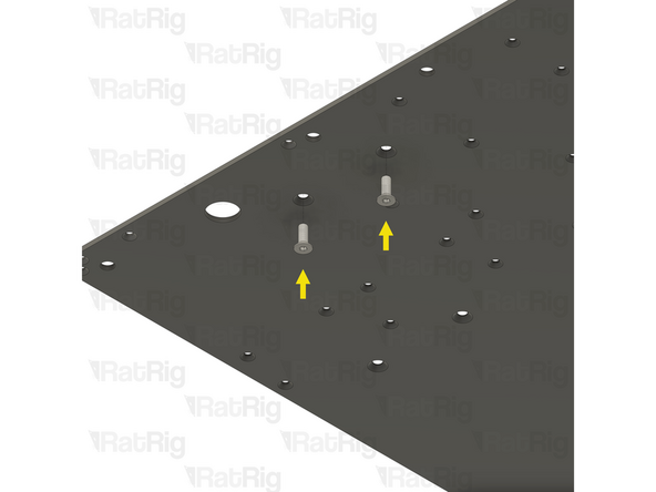 Locate the two marked holes in the base panel