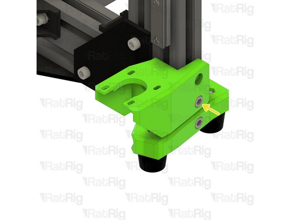 Slide the 3030 T-Nut behind the lower screw hole on the Z-axis motor mount as shown