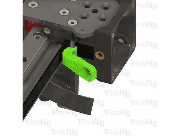 Lever the belt clamp against the exposed screw section and place it inside the belt slot.