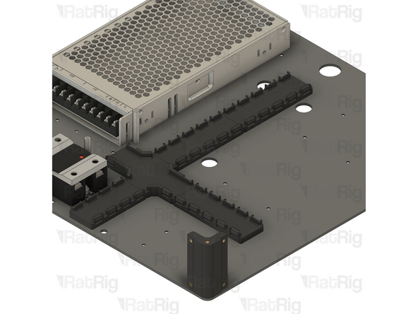 Tighten all six M3x6 Countersink Screws to secure the cable guides to the base panel