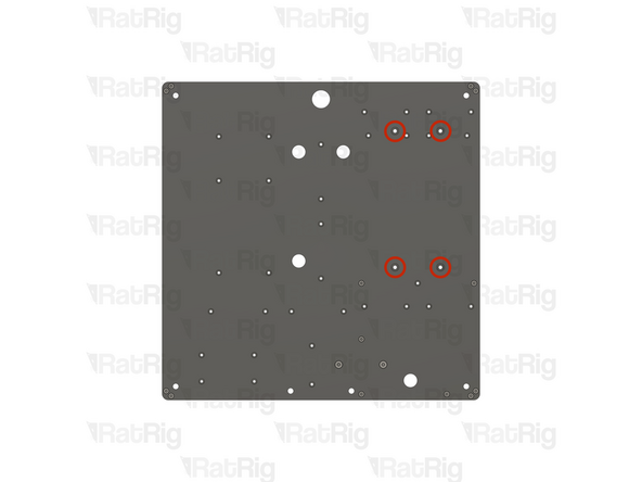 Locate the four marked holes in the base panel