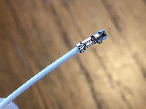 A perfect crimp. The first clamp holds the plastic, the second only wire. The round clutch is unharmed.