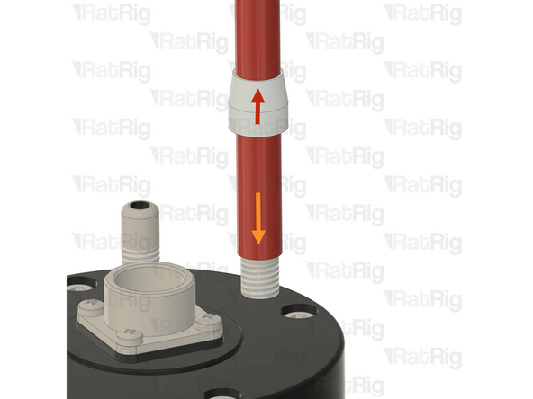 Remove the water hose nut from the spindle and pass the water hose through.