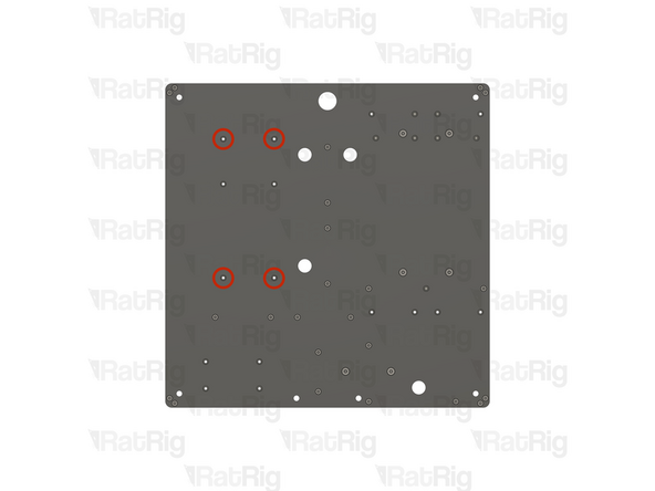 Locate the four marked holes in the base panel