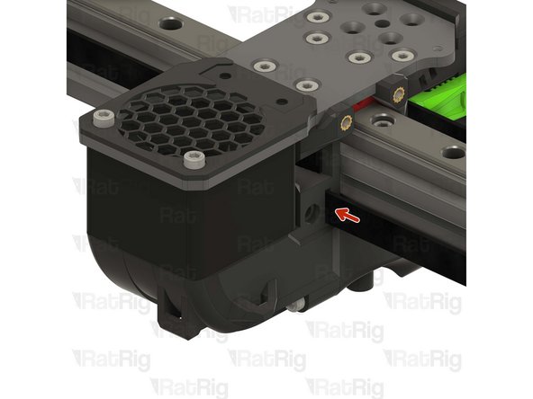 Feed the belt inside the slot on the back part of the toolhead.