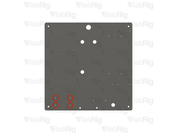 Locate the four marked holes in the base panel