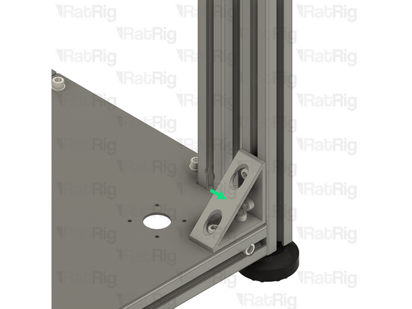Fully tighten both of the M6x12 Cap Head Screws to secure the lower frame bracket to the 3030 extrusion