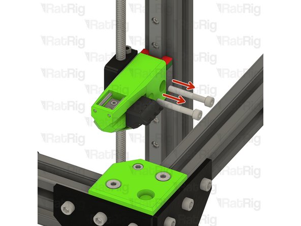 Remove the two marked M5x35 screws from the rear bed arm