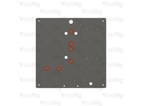 Locate the six marked holes in the base panel
