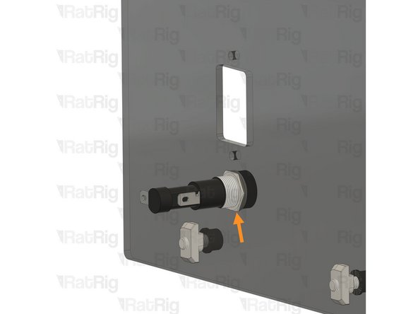Insert the fuse holder through the left panel.