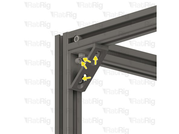 Install the upper corner bracket to the V-Core 4 frame as shown.
