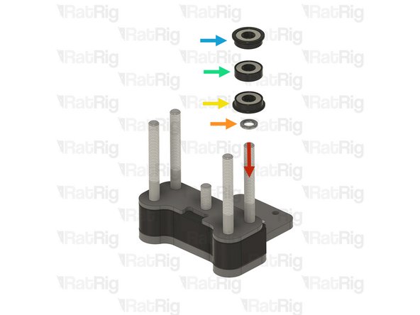 Install the following components, onto the marked screw, in the order shown in the image: