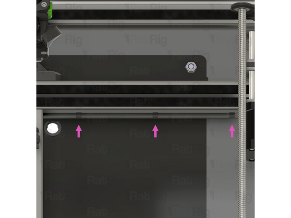 Pass the connector and excess cable through the marked hole in the back panel