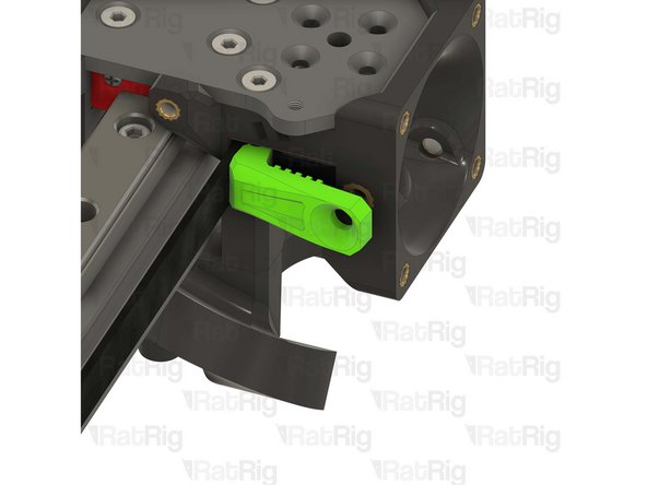 Lever the belt clamp against the exposed screw section and place it inside the belt slot.