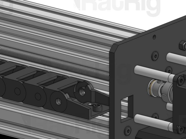 Fit the Drop-in T-Nut mounted on the drag chain inside the 2040 slot and tighten the screw to lock it in place.