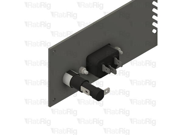 Angle the fuse holder and insert it into the panel as shown