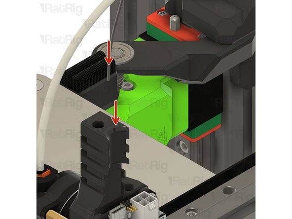 Insert the other end of the piano wire in the designated hole on the EBB toolboard mount
