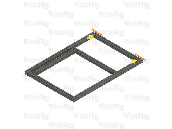 Insert the extrusion on the assembly, making sure the T-nut pins are aligned with the side extrusion slots.