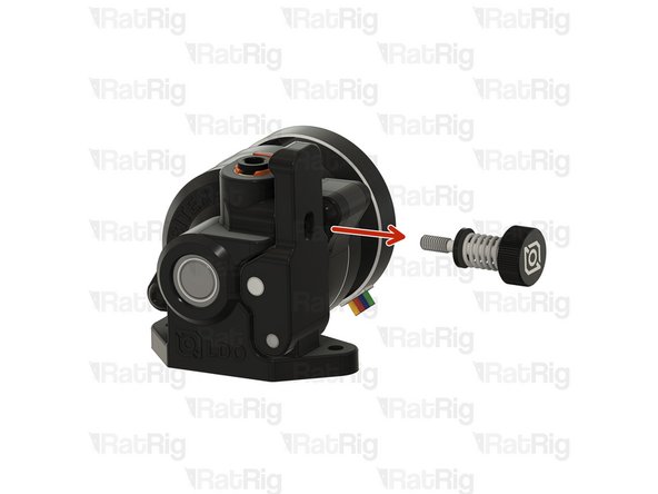 Loosen and remove the tensioning screw from the Orbiter extruder