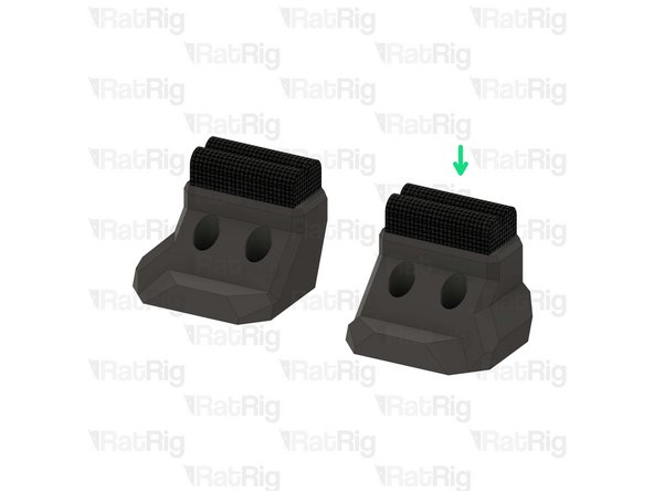 Squeeze two bent felt pads together while inserting them into the wiper body.