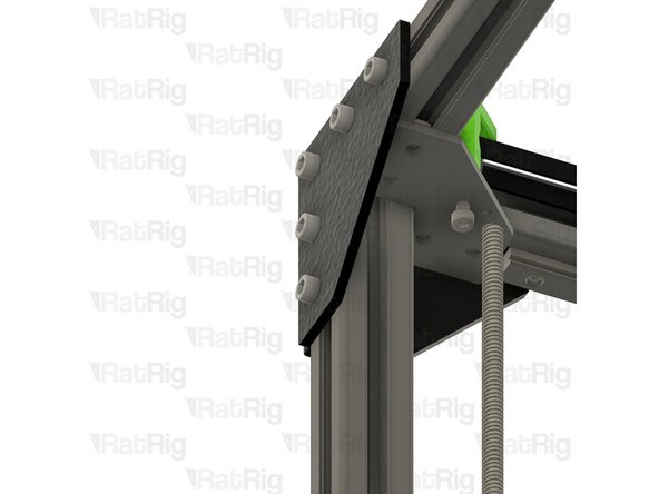 Loosen, but do not remove, the M5x40 screw. Continue holding it in position with one hand