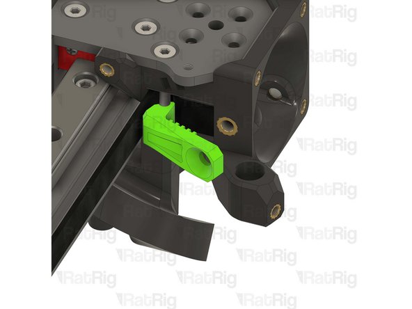 Hook the belt clamp onto the exposed screw, then rotate it into position, making sure it levers against the screw