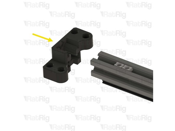 Insert two of the T-nuts into the top extrusion slot