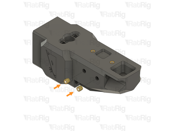 Install an M3 heat insert into each of the marked holes