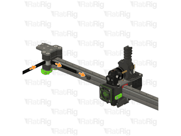 Slowly feed the belt and pull the zip tie at the same time