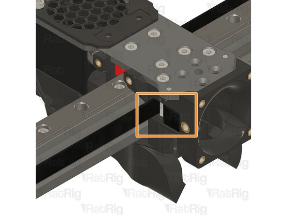 Pull the belt end and gently place it inside the groove.