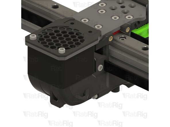 Tighten the M3x35 Cap Head screw while pulling on the belt from the other side.