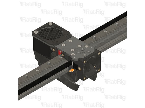 Pull the belt end and gently place it inside the groove.