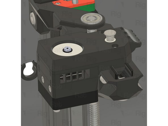 Align the two screws with the heat inserts on the top of the rear Z-axis arm