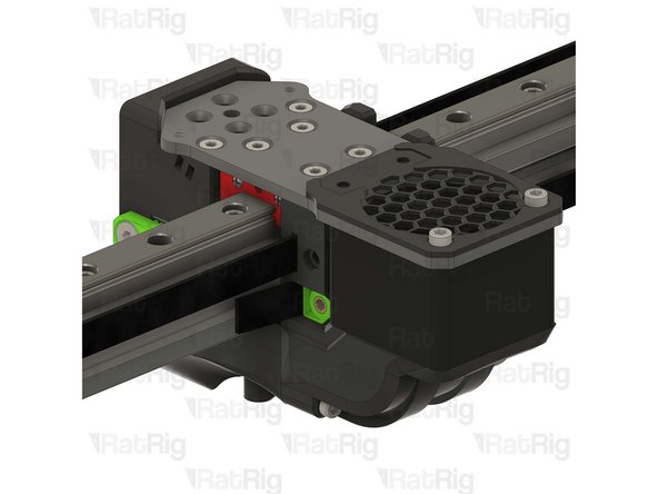 Pull the belt end gently to remove any slack and then insert the belt clamp into the back of the toolhead, pushing it in fully