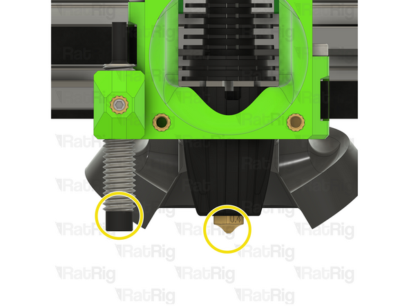 A recommended method to set the correct height is to rest the hot end nozzle on the bed, and then place a cable tie between the bed and the tip of the probe