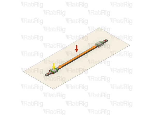 With the linear rail still on the absorbent paper towels, carefully and slowly move the carriage from one end of the rail to the other