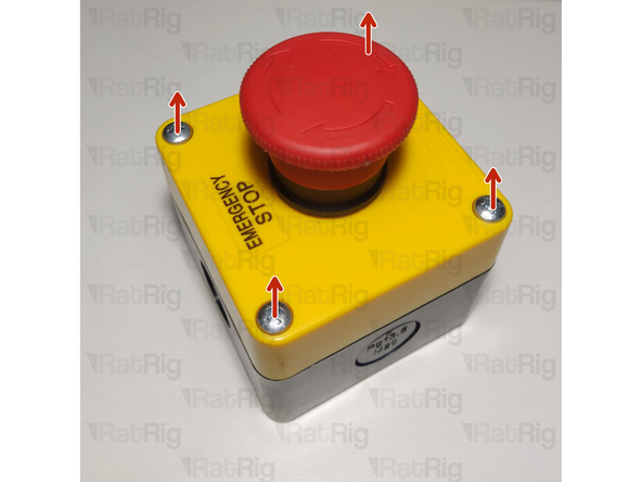 Open the emergency button by removing the four screws