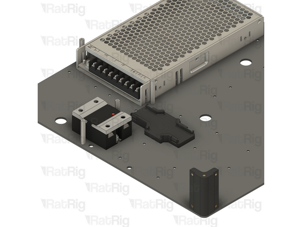 Tighten both M3x6 Countersink Screws to secure the cable guide to the base panel
