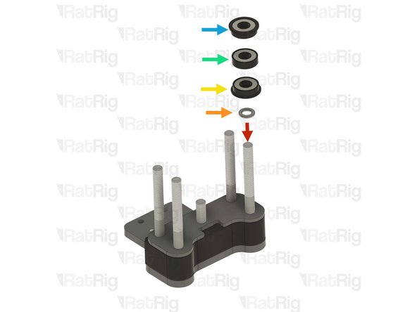 Install the following components, onto the marked screw, in the order shown in the image: