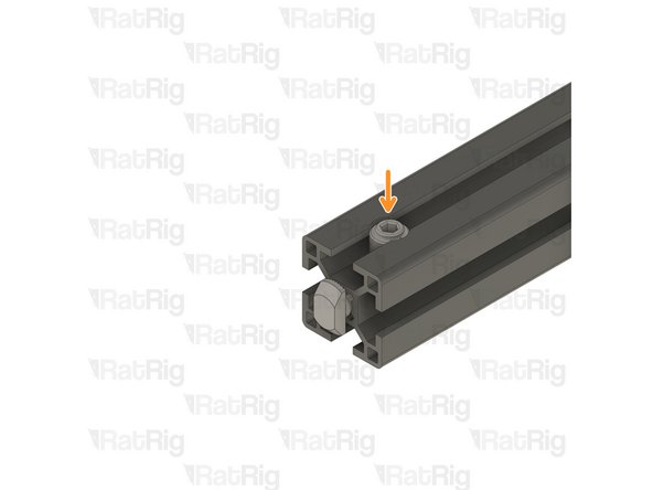 Insert the T-nut pin into the extrusion and quick connector housing