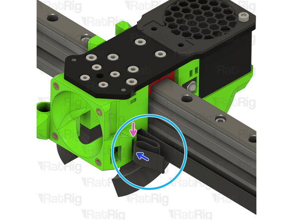 Feed the belt loop into the slot