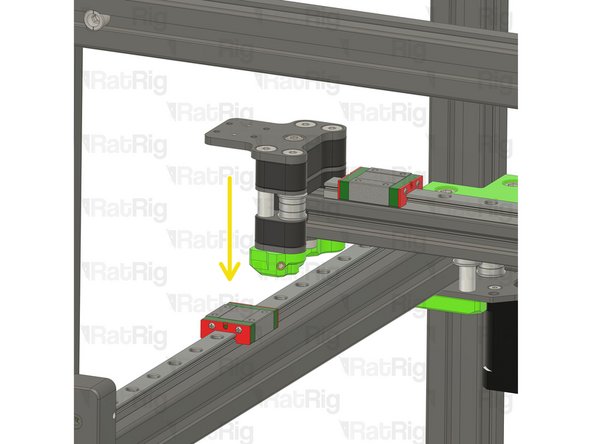 Carefully insert the gantry assembly into the V-Core 4 frame from the side, as shown.