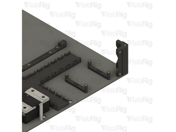 Tighten all four M3x6 Countersink Screws to secure the cable guides to the base panel