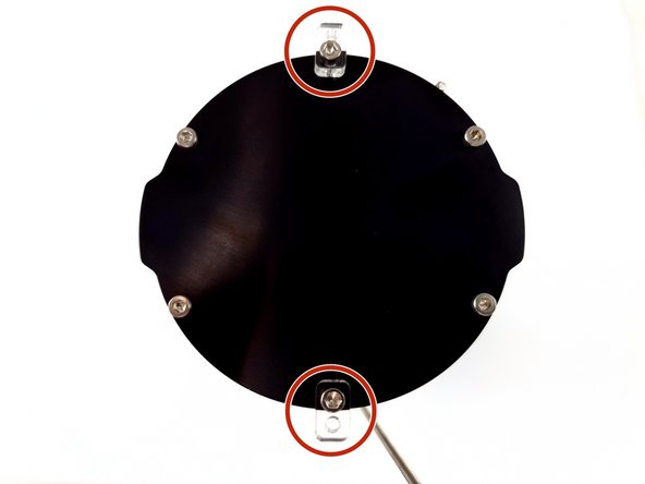 Install the brace supports on the other cap as shown